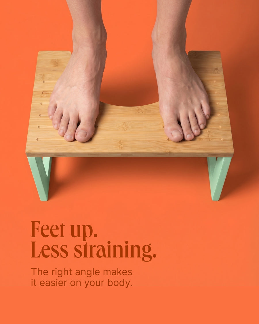 Feet on the Bidetlity toilet stool – push less