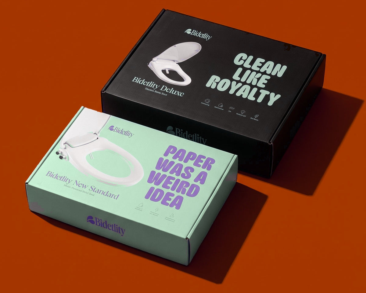 Verpackungen der Bidet-Sitze New Standard und Deluxe